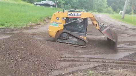 grading lawn with skid steer|grading driveway with skid steer.